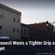 Fostoria News: Downtown Findlay buildings, with headline: Findlay Council Wants a Tighter Grip on the City Budget